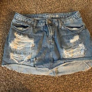 Blue Jean mini skirt by vanilla star. Distressing